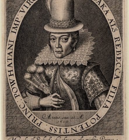 A black and white portrait of Pocahontas. She is surrounded by a circular frame and is wearing a large lace collar and top hat.