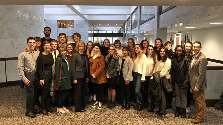 Tina Smith with students and faculty of Democracy and the Arts