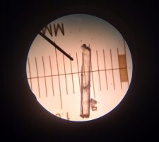 small piece of clear plastic viewed under microscope