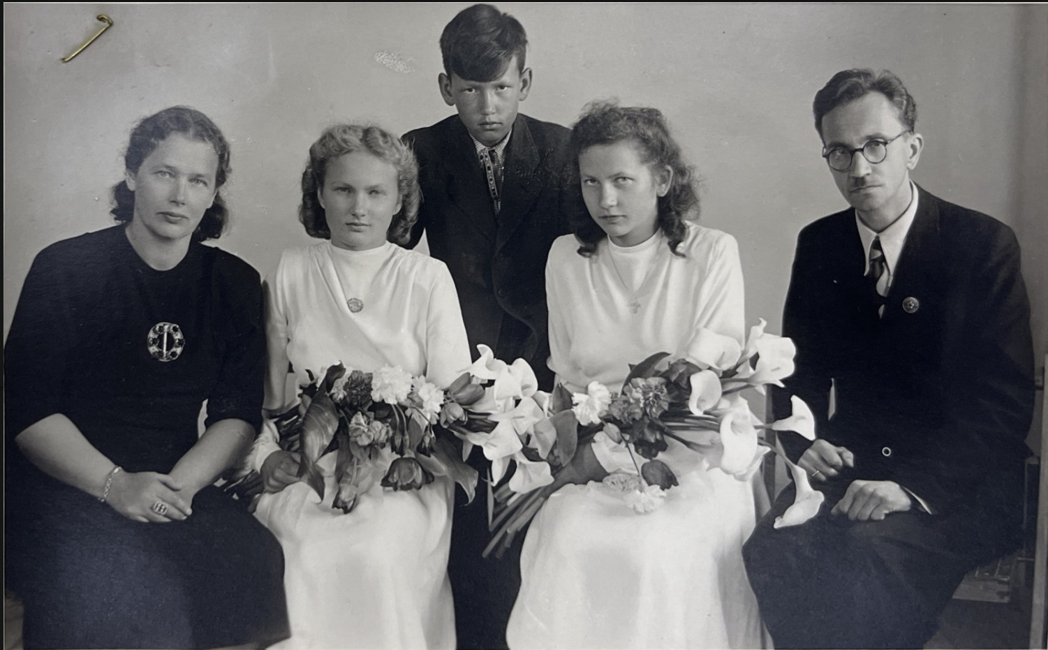 Kramins Family Confirmation Kramins family at Ruta and Ilga's confirmation at Berchtesgaden DP Camp church, pictured left to right: mother Valda Kramins, Ruta Kramins-Bly, brother Andris Kramins, sister Ilga Kramins-Himle, and father Rev. Friedrichs Kramins. Used with permission from Luther Seminary.