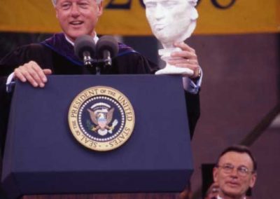 President Clinton holding Schiller.