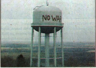 Water Tower with 'NO WAR' painted on it.
