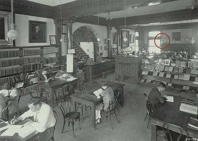 Schiller sitting in Scoville Library, 1926.
