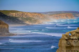 A scenic photo of the sea, beach and cliffs taken along the Great Ocean Road