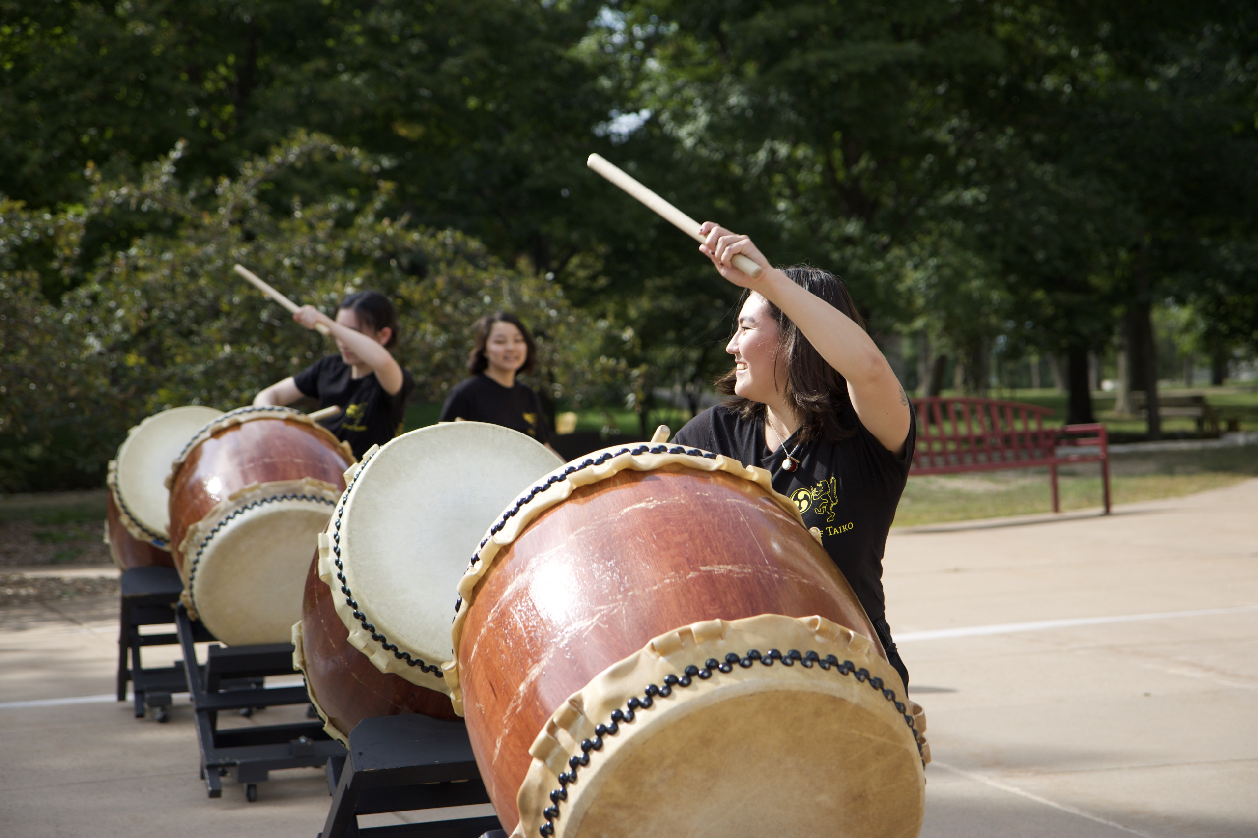 Alyssa Romportl '23, Madeline Chang '24, and Sakuya Yang '25 playing at the 2022 co-curricular fair.